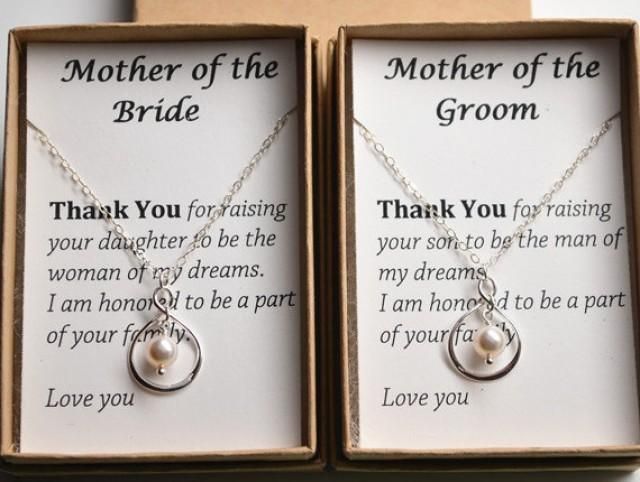 two mother of the bride necklaces in a gift box with thank you for raising