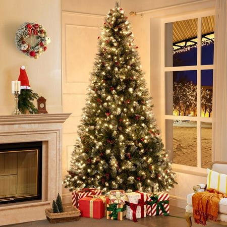 a living room with a christmas tree and presents