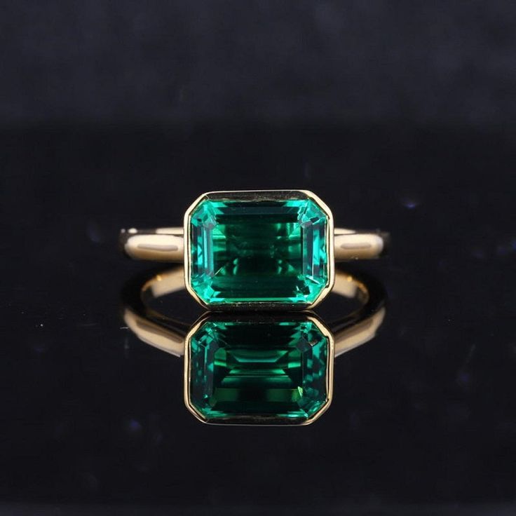 clio-https://clio.giliarto.com/ring/1/550 Green Moissanite Engagement Ring, Engagement Ring Bezel, Green Diamond Rings, Emerald Cut Moissanite Engagement Ring, Green Moissanite, Engagement Ring Moissanite, Emerald Rings, Bezel Engagement Ring, Engagement Ring Prices