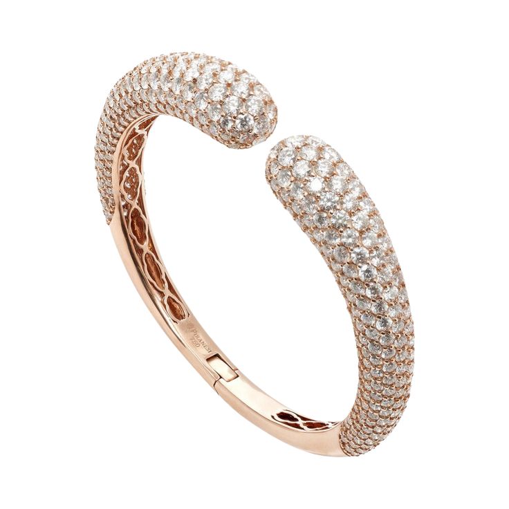 Approx. 18.50cts round Diamonds The bangle is set in 18K Rose Gold Luxury Rose Gold Bangle Cuff Bracelet, Formal Rose Gold Round Cuff Bracelet, Round Jubilee Bangle Fine Jewelry, Rose Gold Round Bangle In Fine Jewelry Style, Luxury Round Bangle With Pave Setting, Rose Gold Hand Set Bangle In Fine Jewelry Style, Luxury Flexible Diamond Bangle, Elegant Diamond Bangle With Pave Setting, Formal Rose Gold Round Bangle