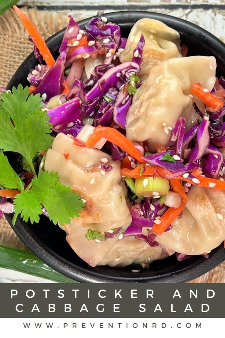 a bowl filled with meat and veggies on top of a table