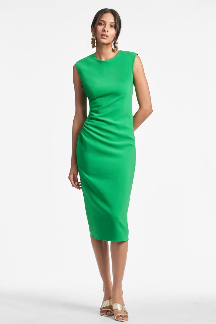 The Diana Dress is a timeless, effortless and chic piece sure to enhance any wardrobe with a pop of kelly green. Crafted with comfort in mind in a thick stretch crepe, her elegant design offers effortless transitions from work to evening events and even weddings. Make dressing up easy - and look beautiful doing it.Details:Model is 5'10" wearing size 242" LongSide ZipperThick Stretch Crepe 92% Polyester - 8% Polyurethane ImportedStyle #R231D11-325 Formal Structured Crepe Dress, Classic Green Midi Dress For Evening, Classic Green Evening Midi Dress, Elegant Green Evening Midi Dress, Elegant Green Midi Evening Dress, Elegant Green Office Dress, Elegant Kelly Green Spring Dresses, Elegant Kelly Green Dress, Elegant Kelly Green Dresses For Spring