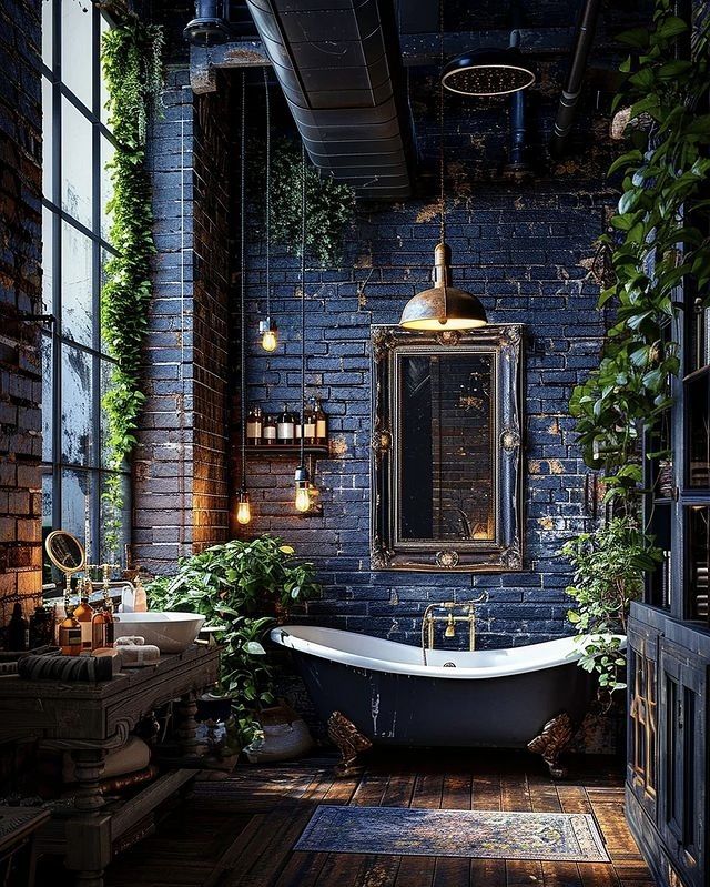 an old fashioned bathtub is surrounded by greenery in this industrial - styled bathroom