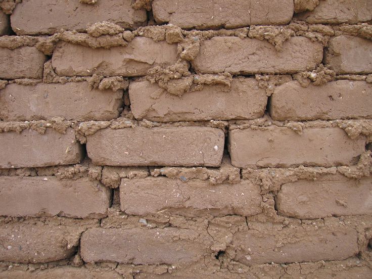 a brick wall that has been built into it's sides and is being used as a background