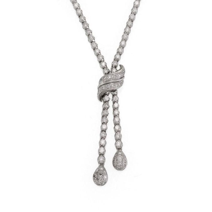 Elegant 3.00ct Diamond 14k White Gold Fancy Lariat Necklace LIQUIDATION! Elegant 3.00ct Diamond 14k White Gold Fancy Lariat Necklace LIQUIDATION! Description This is a beautiful double dangle lariat necklace, it is crafted from 14k white gold with a polished finish. The lower part of the necklace has a short length of prong set diamonds and the top are all polished bead links with a push in clasp and latch. The pendant has a double bar with two dangling strands, all set with diamonds, at the ver Lariat Necklace, Prong Setting, White Gold, Beads, Pendant