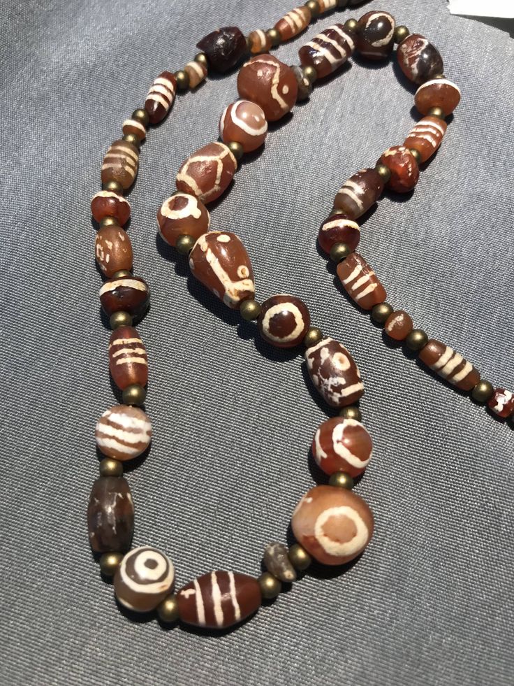 Brown Carnelian Amulet Necklace, Brown Amulet Necklaces With Large Beads, Vintage Brown Carnelian Necklace, Carnelian Amulet Necklace With Round Beads, Vintage Polished Brown Beads, Gems And Cabochons, Vintage Brown Polished Beads, Gems, And Cabochons, Vintage Brown Agate Beaded Necklace, Vintage Brown Agate Beaded Necklaces, Vintage Brown Agate Necklace