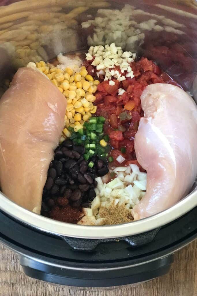 the ingredients are in the slow cooker ready to be cooked