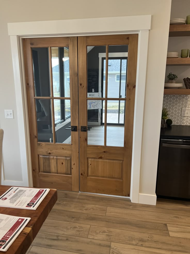 the kitchen is clean and ready to be used as a dining room or living room