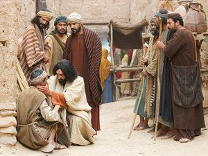 a group of men standing next to each other