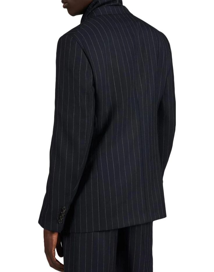 The sleek Blazer is a minimalist's dream. Crafted from pure wool in Italy, its pinstriped design adds refined texture without unnecessary flourishes. From its clean, single-breasted design to its fully lined interior with pockets, this blazer balances form and function. As comfortable as it is stylish, it layers seamlessly over any outfit from casual to corporate. An investment piece you reach for again and again. Pinstripe Blazer With Hidden Button Closure, Semi-formal Pinstripe Blazer With Long Sleeves, Semi-formal Pinstripe Long Sleeve Blazer, Semi-formal Long Sleeve Pinstripe Blazer, Luxury Pinstripe Outerwear With Notch Lapel, Pinstripe Blazer With Lapel Collar For Work, Luxury Striped Long Sleeve Blazer, Pinstripe Business Suits With Lapel Collar, Tailored Pinstripe Blazer For Work