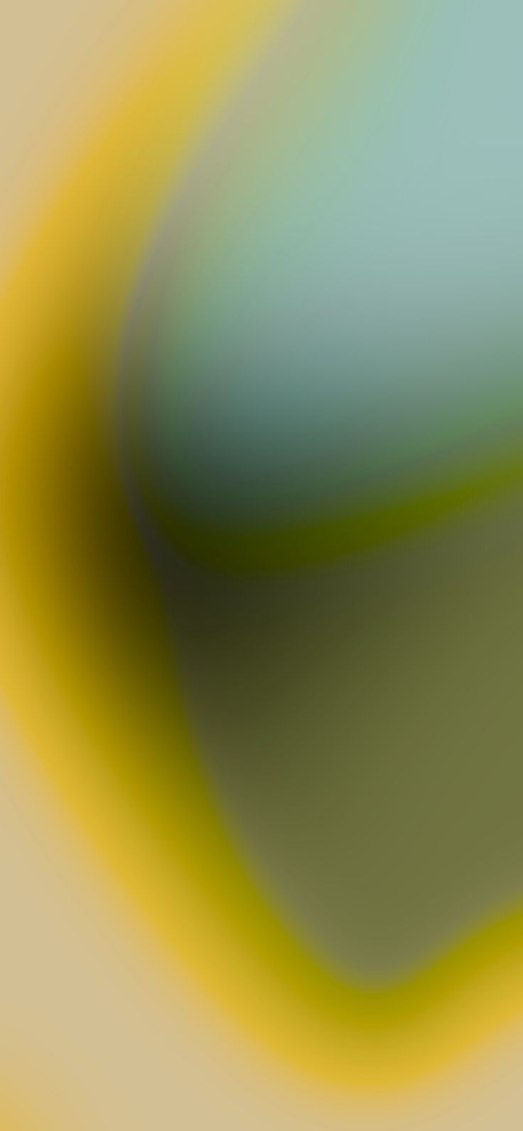 an abstract blurry background with yellow and green colors