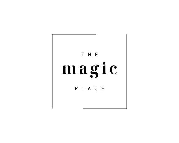 the magic place logo in black and white with a square frame on top of it