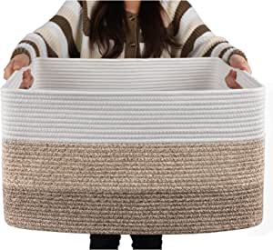 a woman is holding a large basket in front of her face