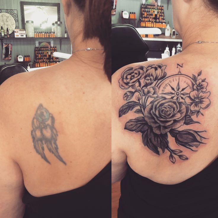 the back of a woman's shoulder with flowers and an owl on it