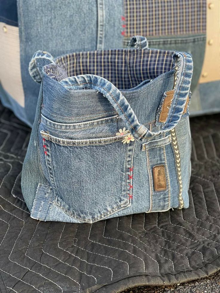 an old pair of jeans has been turned into a purse