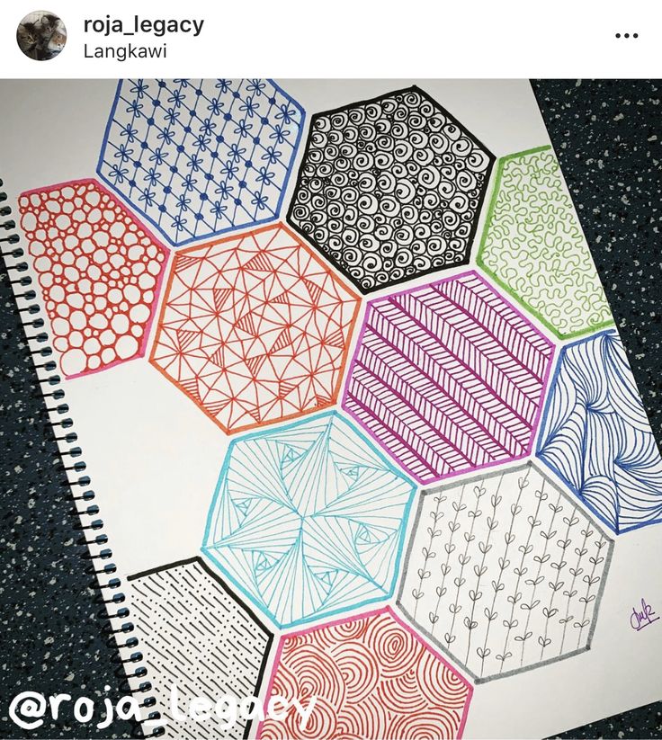 an image of hexagons made with colored pencils on top of paper