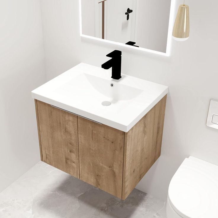 a bathroom with a sink, mirror and toilet