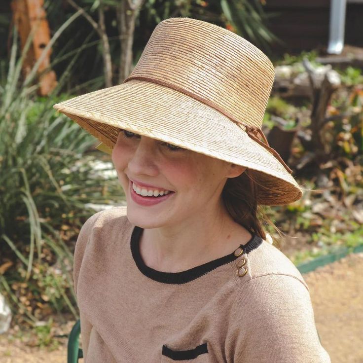 These hats are the best for sun protection– UPF 50+ - by the California Polytechnic Textile Research and Testing Laboratory, meaning sunlight won’t filter through, keeping your skin safe and healthy.* Handmade in Mexico Materials: 100% natural palm fiber One size (hat size 7, 22 inches) Approximately 3.5 in. brim. View Sizing Chart Stretch sweatband Leather chinstrap with wooden be Lightweight Solid Sun Hat With Uv Protection, Lightweight Wide Brim Hat For The Beach, Lightweight Wide Brim Hat For Beach, Coastal Sun Hat With Upf 50+ For Sunbathing, Lightweight Curved Brim Hat For Sunbathing, Lightweight Hats With Curved Brim For Sunbathing, Lightweight Hats With Uv Protection For Beach Season, Upf 50+ Panama Hat For Vacation Sunbathing, Adjustable Lightweight Panama Hat For Sunbathing