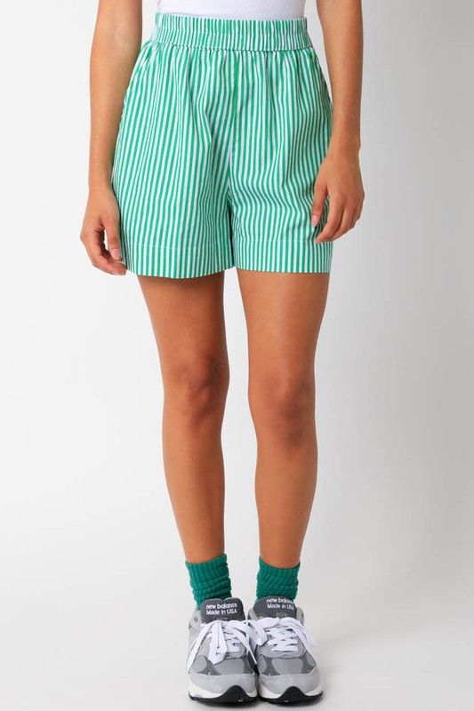 Shorts feature elastic waist band and mini length fit 100% Cotton Cotton Bottoms With Banded Waist And Relaxed Fit, Short Bottoms With Elastic Waistband, Green Cotton Pajama Shorts, Relaxed Fit Bottoms With Elastic Waistband And Short Length, Relaxed Fit Shorts With Banded Waist For Spring, Casual Shorts With Banded Waist For Spring, Trendy Green Relaxed Fit Shorts, Green Cotton Pajama Shorts With Elastic Waistband, Casual Short Bottoms With Banded Waist