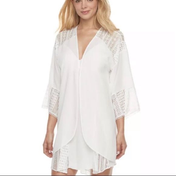 Refresh Your Lingerie Collection With This Women's Apt. 9 Kimono Wrap. Product Features Romantic Chiffon Fabric Beautiful Lace Back Yoke & Sleeves 3/4-Length Sleeves With Pom-Pom Trim Open Front Fabric & Care Polyester Machine Wash - Delicate White V-neck Cover-up For Loungewear, White V-neck Loungewear Cover-up, Lace V-neck Sleepwear For Spring, Spring Lace V-neck Sleepwear, Summer Lace V-neck Sleepwear, Lace V-neck Summer Sleepwear, Lace V-neck Sleepwear For Summer, Bohemian White Sleepwear For Daywear, Summer Vacation Sleepwear With Lace Trim