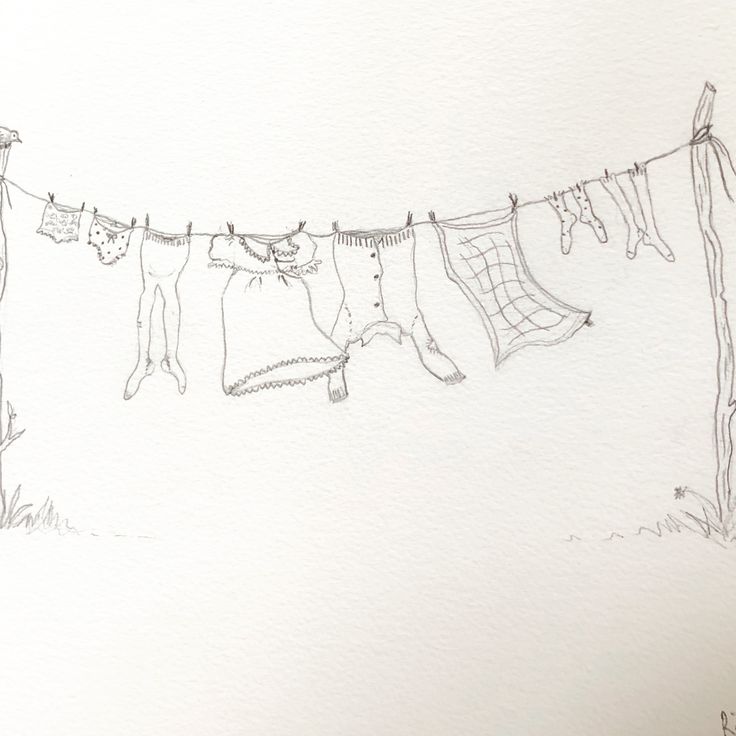 a drawing of clothes hanging on a line