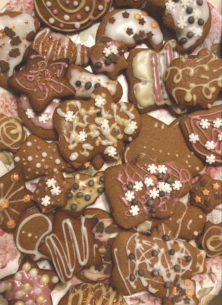 some very pretty decorated cookies in a box