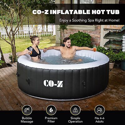 an inflatable hot tub with two people inside