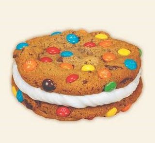 an image of a cookie with candy and m & m cookies on the top layer