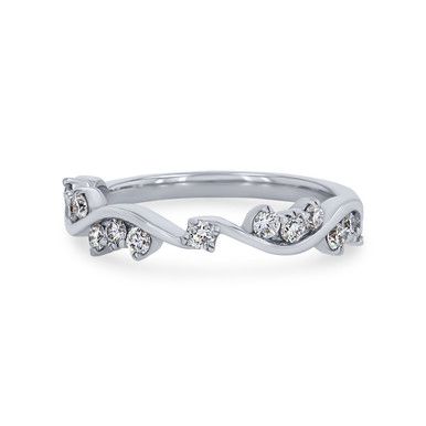 a white gold ring with three diamonds