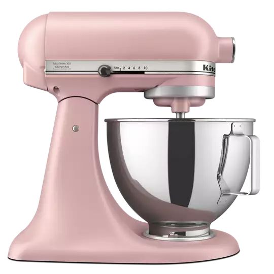 a pink mixer is shown on a white background