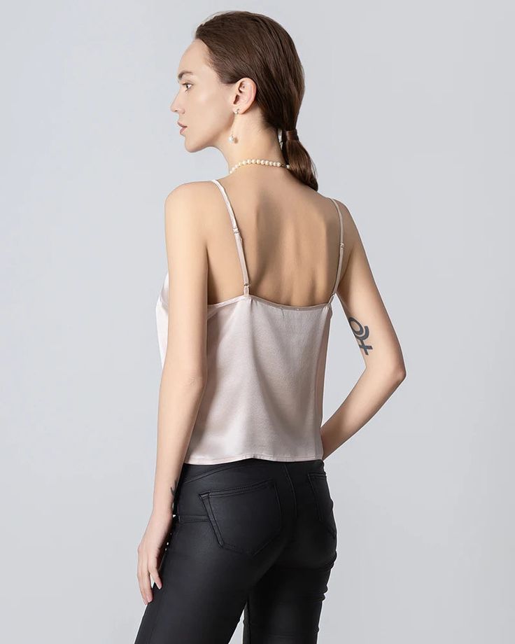 Type: Front Open Silk Camisole.Material: 22 Momme Luxury Mulberry Silk.Details: Classic Solid Color, Designed Front Open&V-neck, Regular Fit. Introducing our luxurious V-neck Front Open Silk Camisole, meticulously crafted from the finest silk for unrivaled elegance. The flattering V-neckline enhances the décolletage, while the front open design adds modern flair. Its smooth silk fabric drapes gracefully for a flattering silhouette. Versatile for day or night, it's a wardrobe essential. Indulge i Silk Camisole, Open Design, Top For Women, Draped Fabric, Guinea Bissau, Equatorial Guinea, Mozambique, Mulberry Silk, Silk Fabric