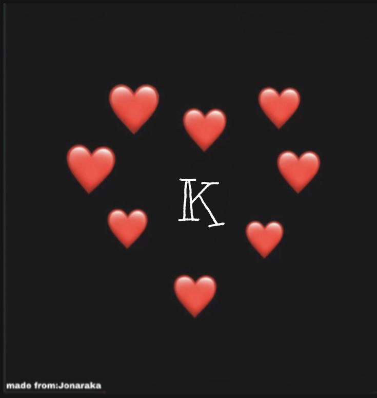 red hearts arranged in the shape of letters k and i on a black background with white lettering