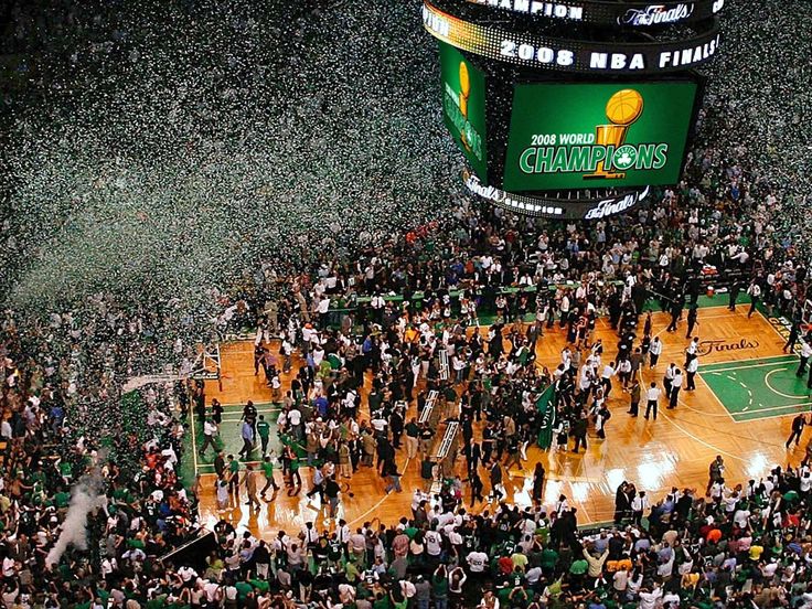 confetti is thrown over the crowd at a basketball game in boston, ma