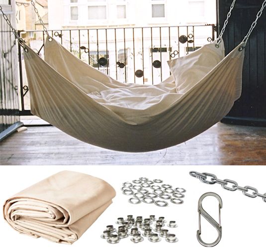 there is a hammock hanging in the air with chains and hooks attached to it