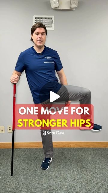 a man standing on top of a pole with the words one move for stronger hipss