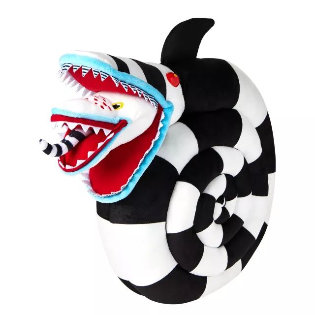 a black and white fish with red teeth on it's head is in the shape of a ball