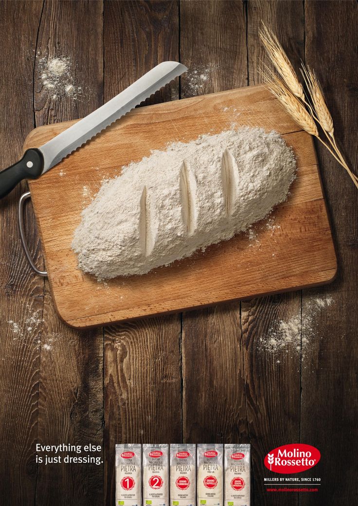 a wooden cutting board with flour on it