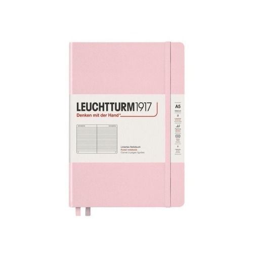 a pink notebook with the words leuchturm 1917 on it