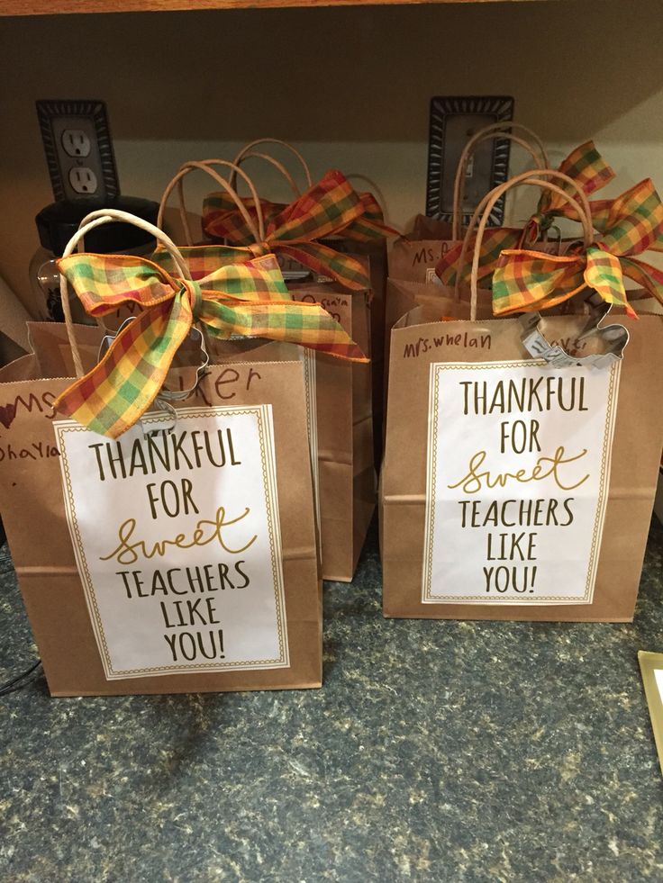 two brown paper bags with thank you for teacher's like you written on them