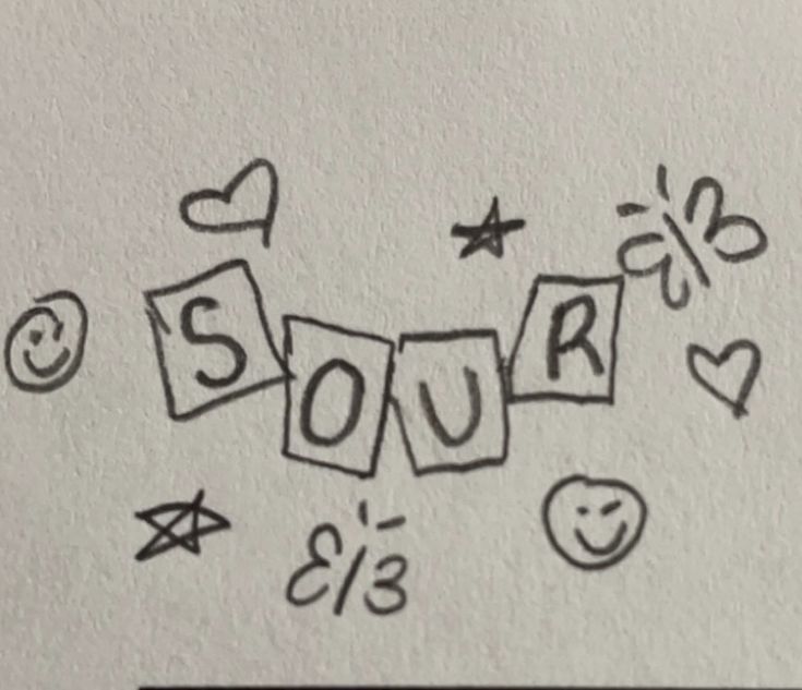 the word sour written in black ink on a white piece of paper with hearts and stars