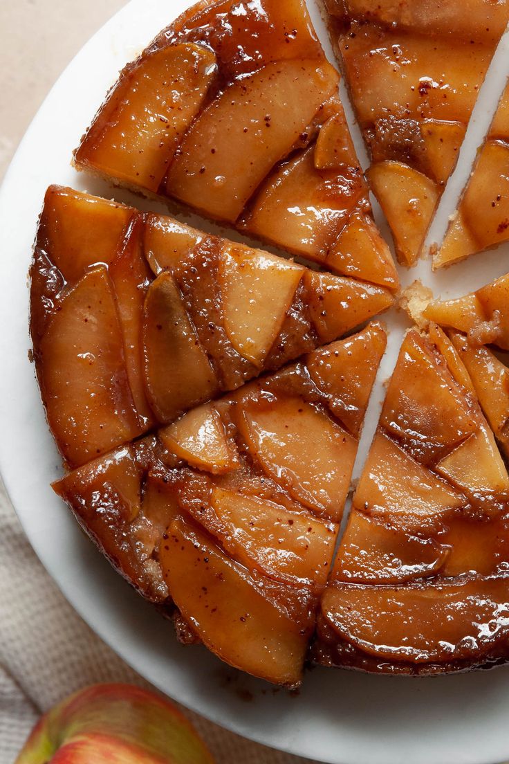 slices of apple upside down cake on a white plate