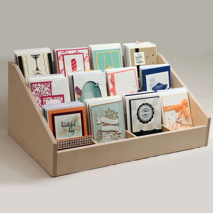 a wooden box filled with lots of cards