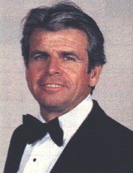 a man in a tuxedo and bow tie