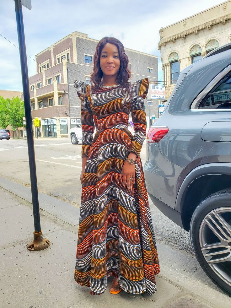 Ankara maxi dress beautifully and carefully made with love. Designed with a silver embellishment. You can never go wrong with this dress, designed to bring out the beauty in you. This dress is a show stopper made for a party rocker. Bohemian Long Dress For Fall, Bohemian Long Skirt Dress For Fall, Long Skirt Dresses For Fall Night Out, Fall Night Out Long Dress, Bohemian Long Skirt Evening Dress, Bohemian Long Evening Dress, Bohemian Floor-length Dress For Night Out, Fitted Long Skirt Maxi Dress For Fall, Fitted Maxi Dress For Fall