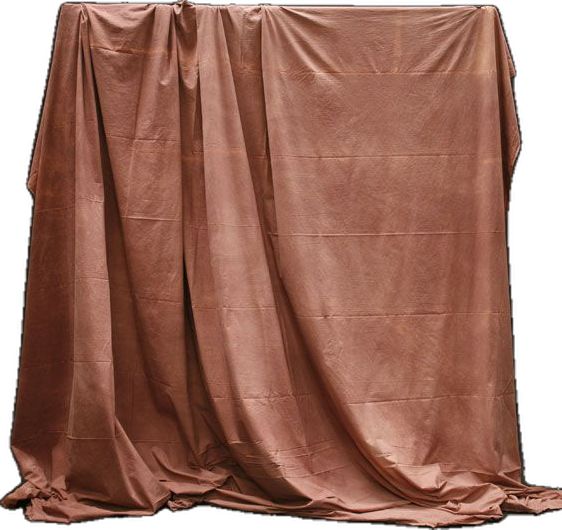 a brown cloth draped over a white background