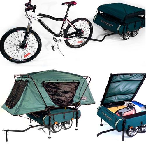 the bike is equipped with a trailer and cargo bag