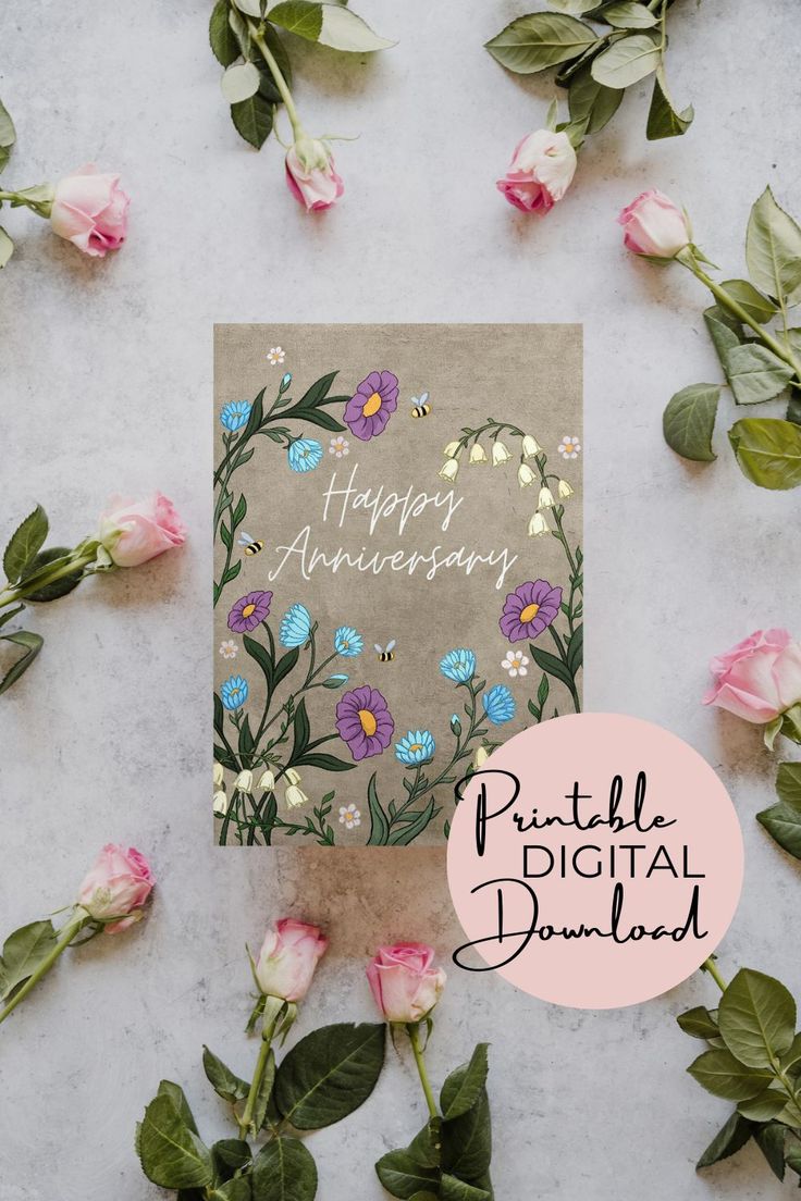 a greeting card with flowers on it and the words happy anniversary