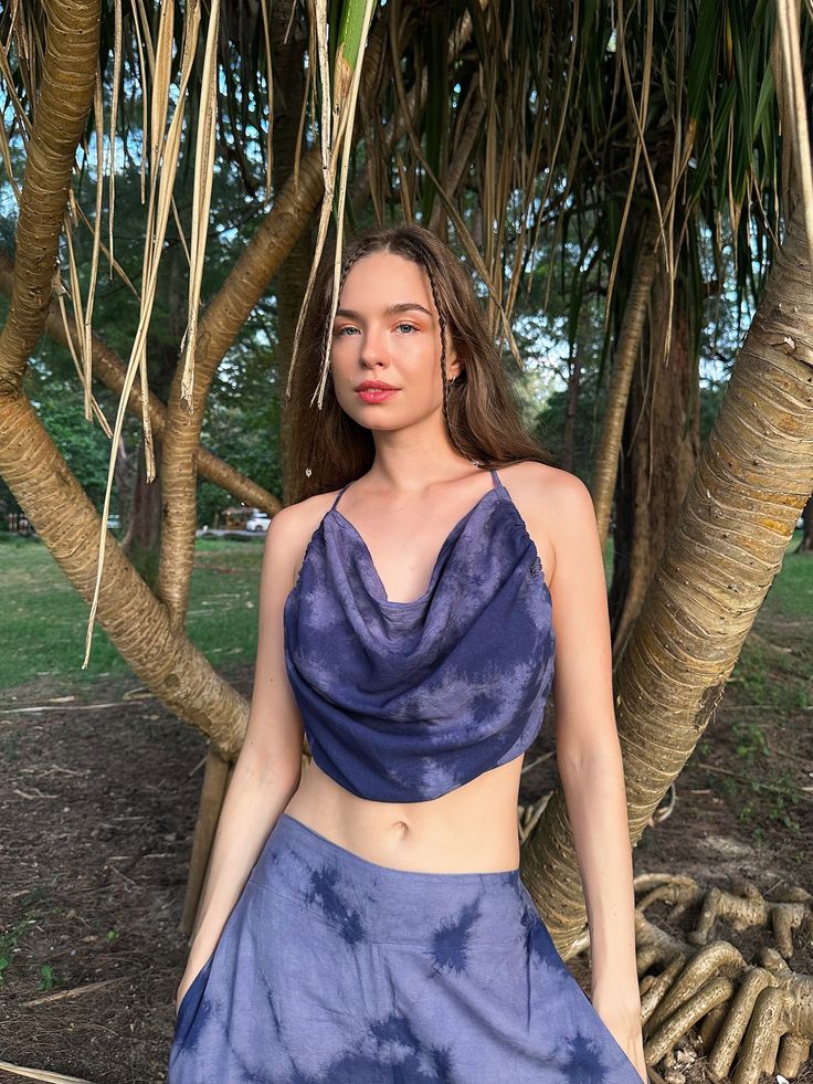 Introducing our new handcrafted Maya Crop Top in Hand Tie dye Marble , where playful style, bohemian vibes, and comfort come together effortlessly. This lovely piece is made from soft, lightweight fabric that's perfect for any occasion, whether it's yoga day, a music festival, or a beach vacation. Complete your look with the Kimono robe and Maya Boho Wide Leg Pants for head-to-toe vibrancy. Plus, the adjustable sleeve cinched crop top keeps you in fashion all year round. It's the perfect choice Hippie Yoga Tops For Summer, Bohemian Washed Tops For Summer, Summer Bohemian Washed Tops, Bohemian Acid Wash Top, Bohemian Tie-dye Tops For Summer, Bohemian Yoga Tops For Summer, Bohemian Tie Dye Tops For Vacation, Bohemian Hand Dyed Tops For Beach, Bohemian Tie-dye Tops For Vacation