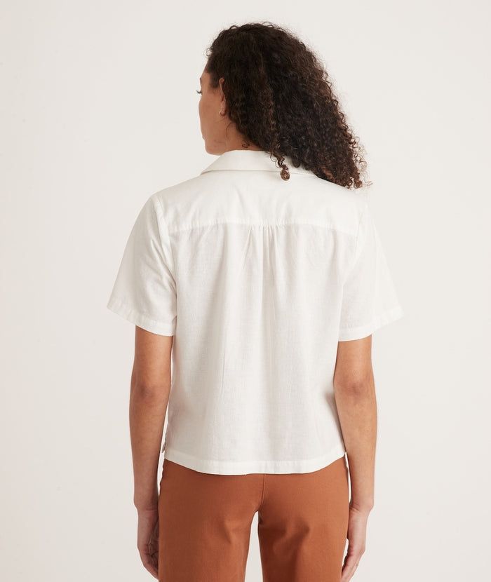 Lucy Resort Shirt in White – Marine Layer Relaxed Fit Button-up Camp Shirt For Casual Gatherings, Collared Cropped Shirt For Day Out, Effortless Relaxed Fit Collared Tops, Effortless Collared Relaxed Fit Tops, Summer Vacation Tops With Collared Neckline, Summer Tops With Collared Neckline For Vacation, Summer Collared Neckline Top For Vacation, Casual Johnny Collar Tops For Vacation, Effortless Summer Shirt For Casual Gatherings