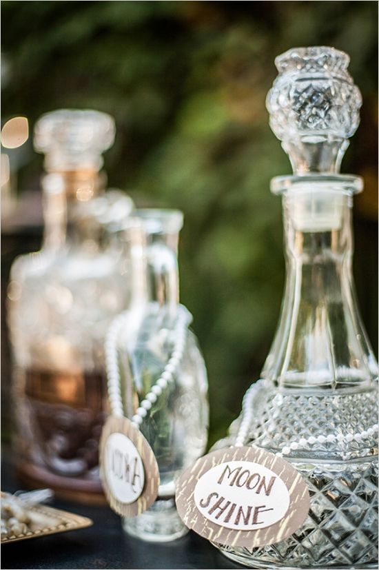 some glass bottles are sitting on a table